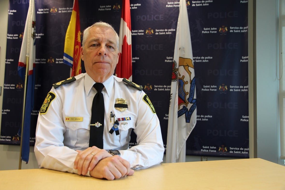 Man in uniform at desk