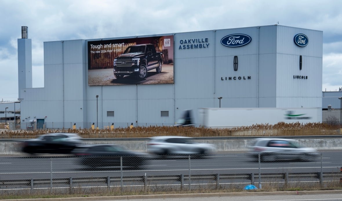 ford-oakville-assembly-20240405-1 Cars zoom past the Ford Oakvielle Assembly plant in Oakville