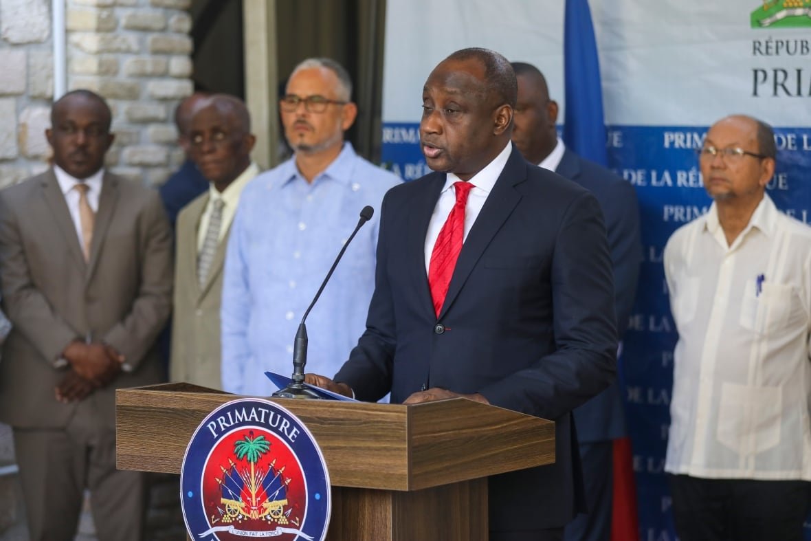 A man speaks at a podium.