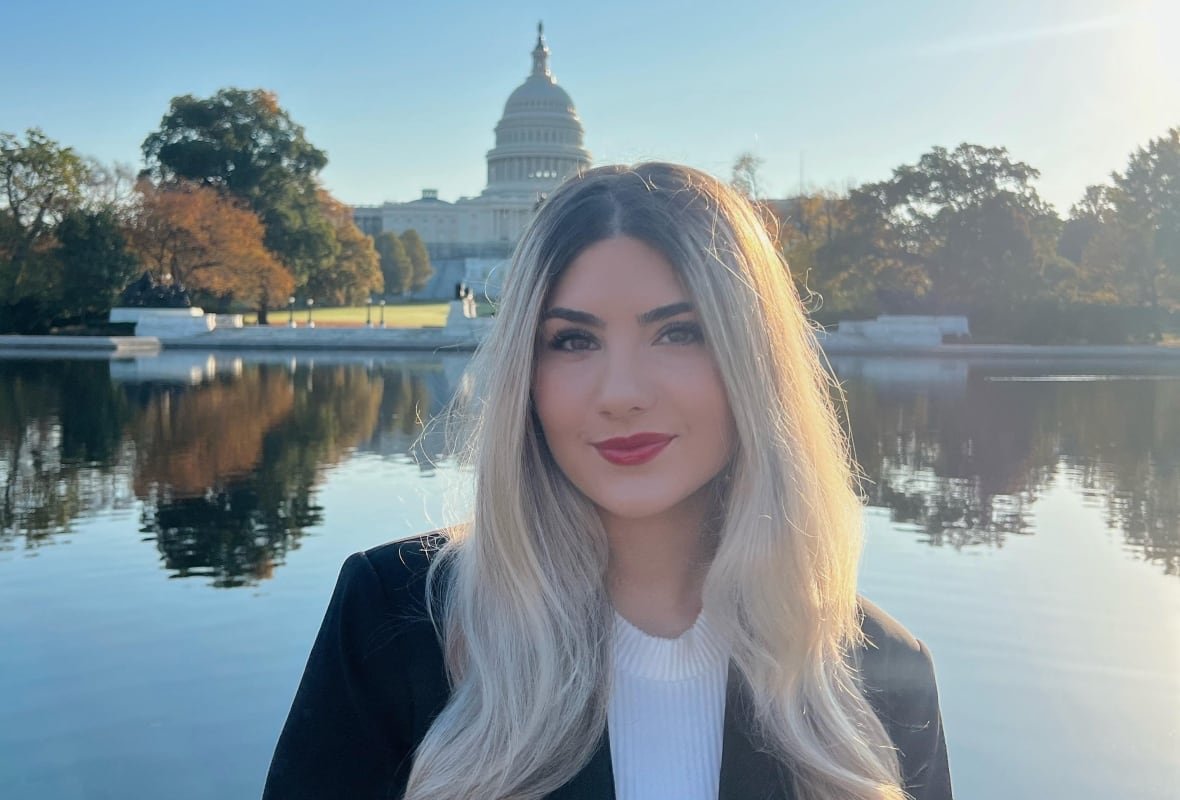 Young woman in front of US Capitol