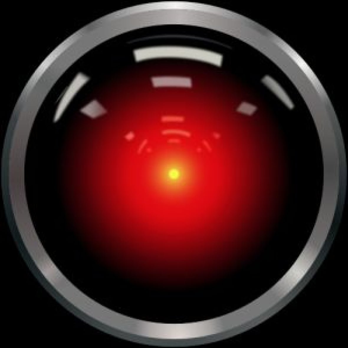A closeup of a large, red camera lens is seen in a still from the movie 2001: A Space Odyssey.