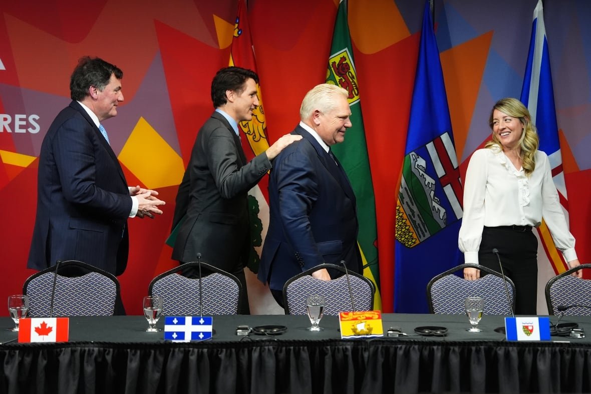 Intergovernmental Affairs Minister Dominic Leblanc, left, and Foreign Affairs Minister Melanie Joly, right, share a laugh with Prime Minister Justin Trudeau and Ontario Premier Doug Ford as they leave a press conference to conclude a first ministers meeting, in Ottawa, Wednesday, Jan. 15, 2025.