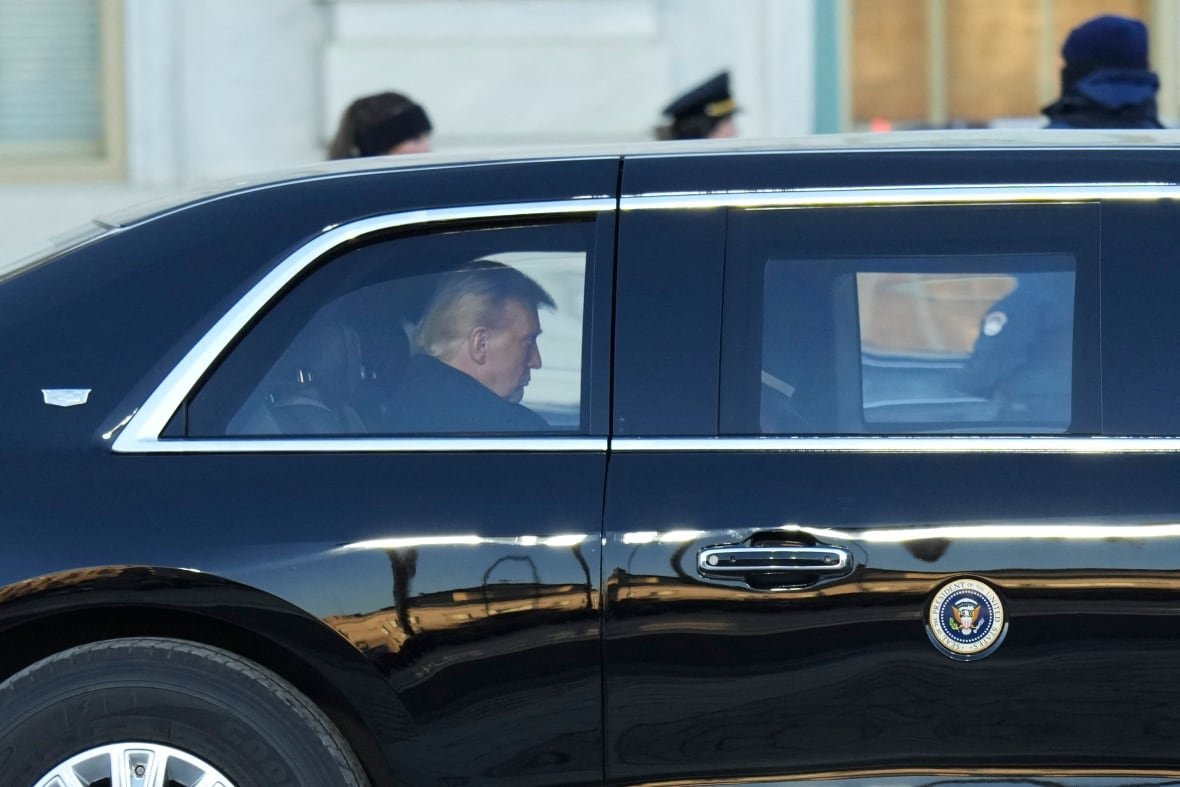u-s-president-donald-trump-leaves-the-u-s-capitol-after-being-sworn-in-as-president-for-2nd-time Side-view of face of U.S. President Donald Trump, as he sits in a vehicle outside the U.S. Capitol.