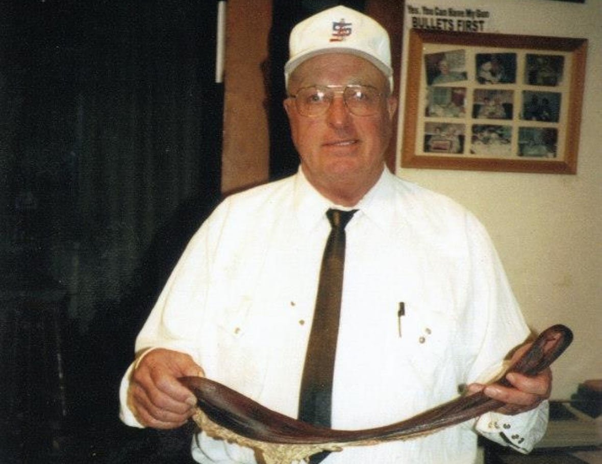 uncle-gus Jeff Woodward's uncle, Gus Wickstrom, holding a pig spleen in 2002 in Tompkins, Sask.