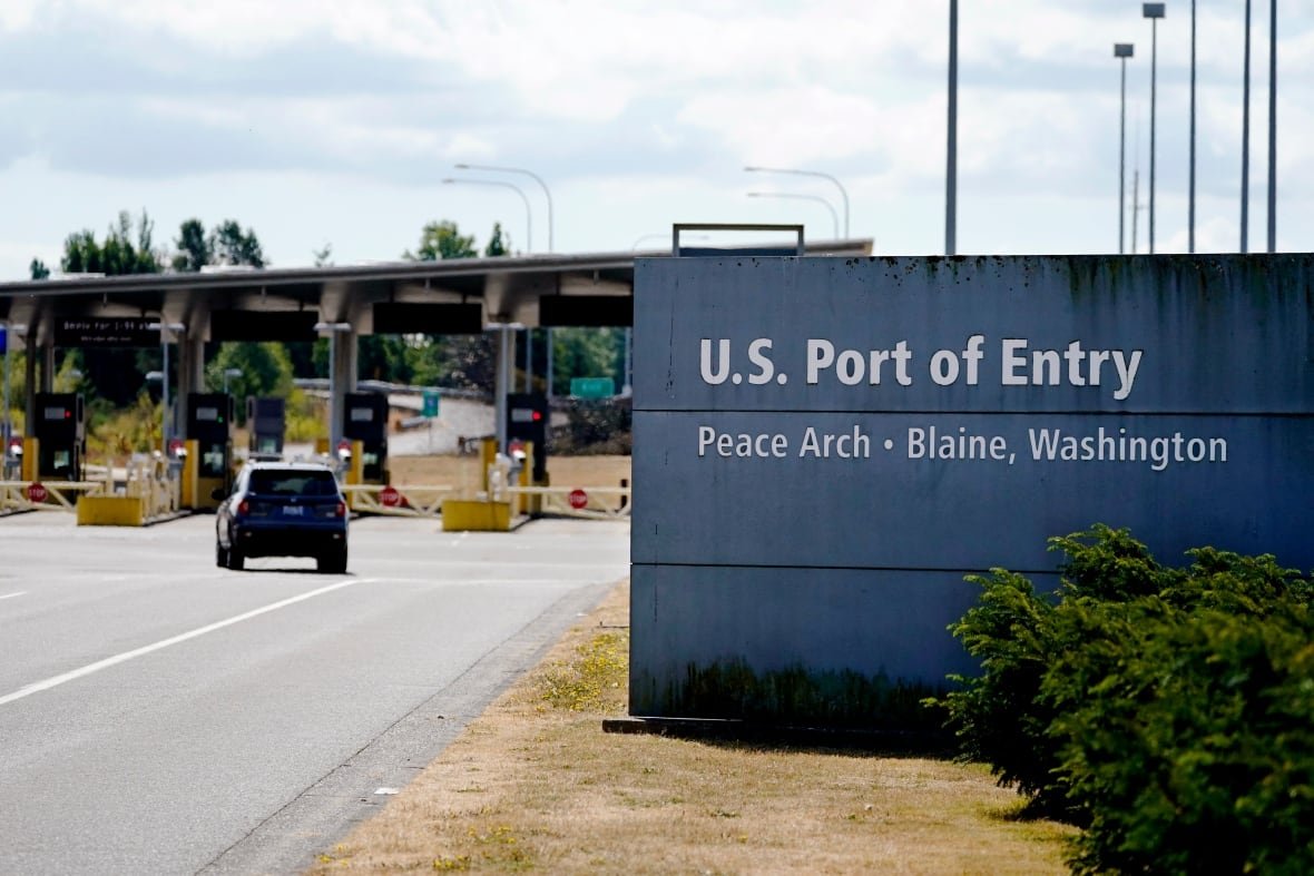 A photo of a sign at the Peace Arch Border crossing in Surrey, B.C.
