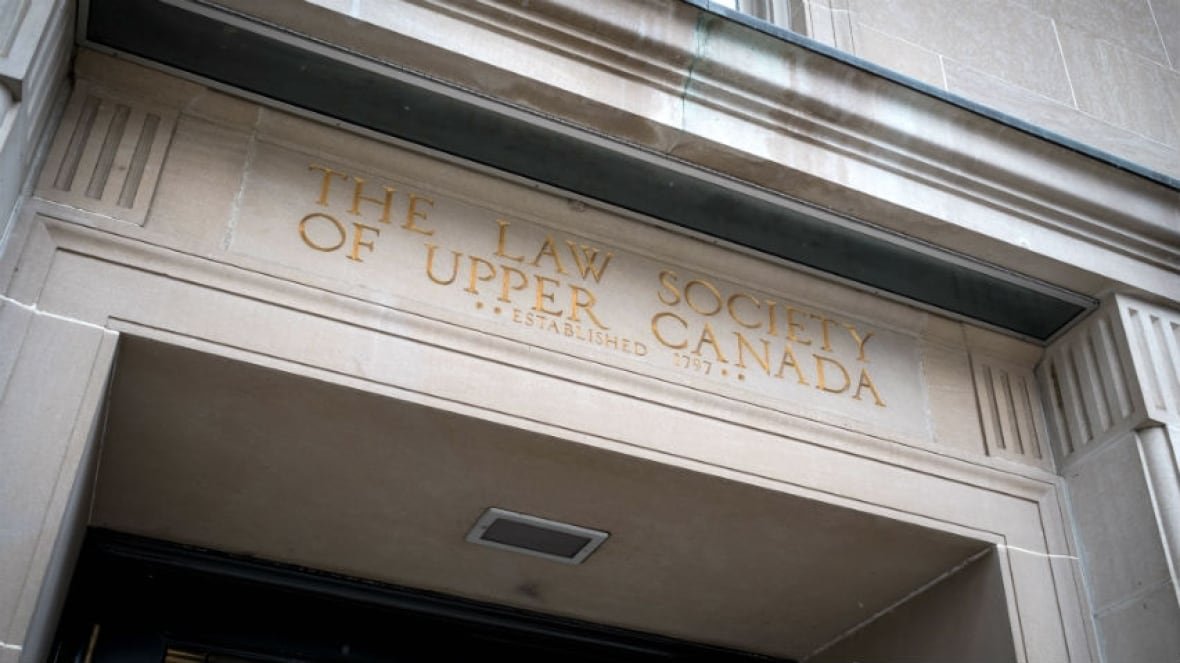 building-of-the-law-society-of-ontario-formerly-ls-of-upper-canada-1 The entrance of a building with the words 'the Law Society of Upper Canada' above it.