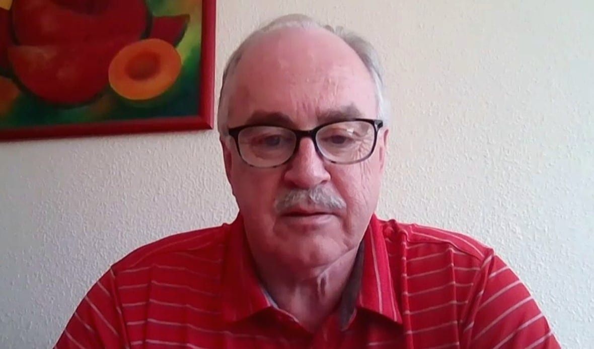 Man in red shirt