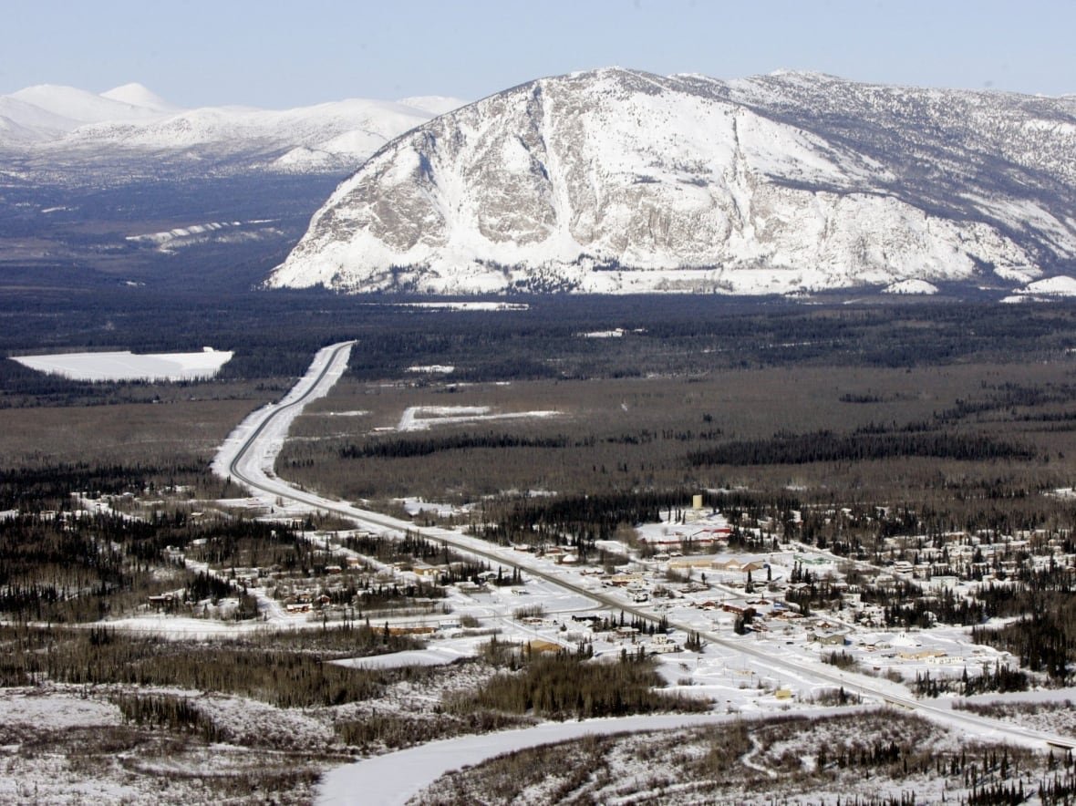 A view of a small village in the snowy mountains.