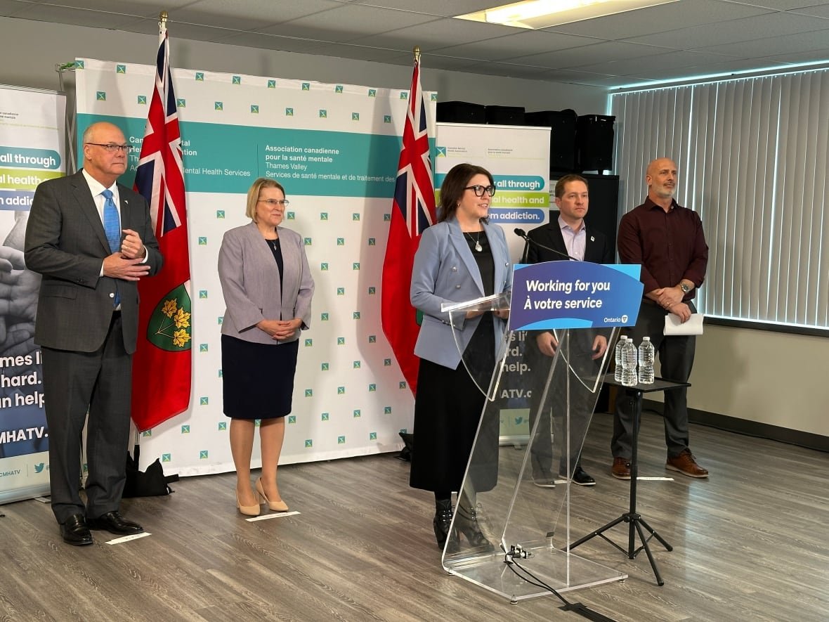 From left to right: Elgin-Middlesex-London MPP Rob Flack, Health Minister Sylvia Jones, London's Mayor Josh Morgan, and CMHA Thames Valley's vice president of supportive housing stand alongside CEO Pam Tobin, centre, announcing London's HART hub.