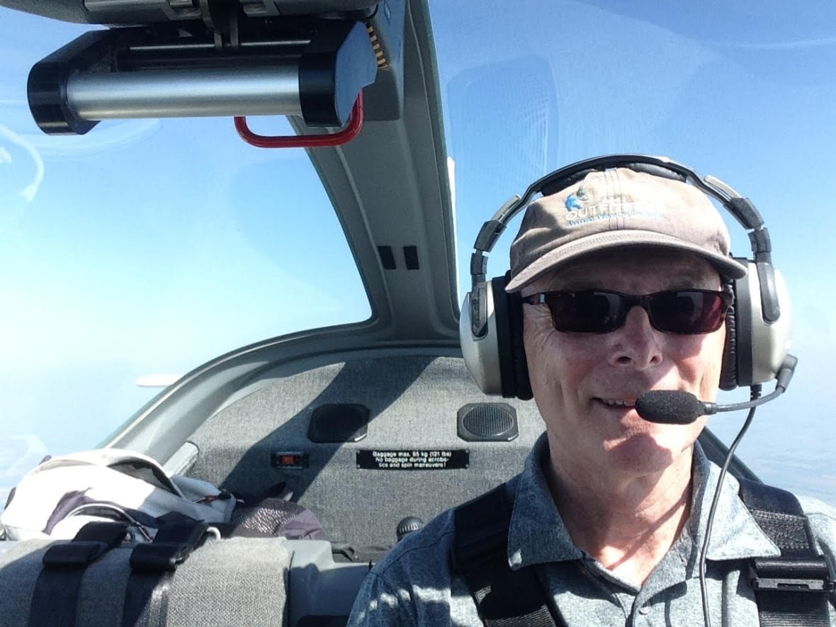 pilot-michael-jones Michael Jones at the controls of the plane he piloted around southwestern Ontario Wednesday in a path that draws out the perfect shape of the Maple Leaf.