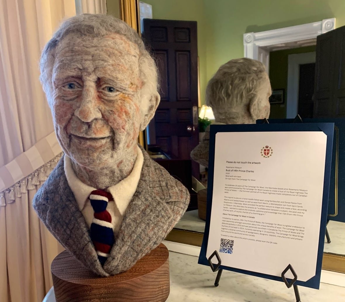 A bust made of wool shows a person's head and shoulders.