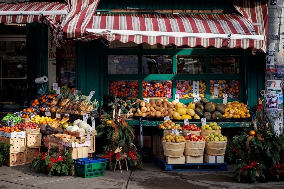 Produce sits on stands outside a Toronto market.