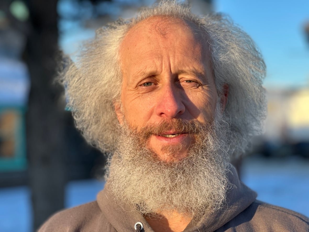 sebastian-schnuelle Close up of a man with a white beard.
