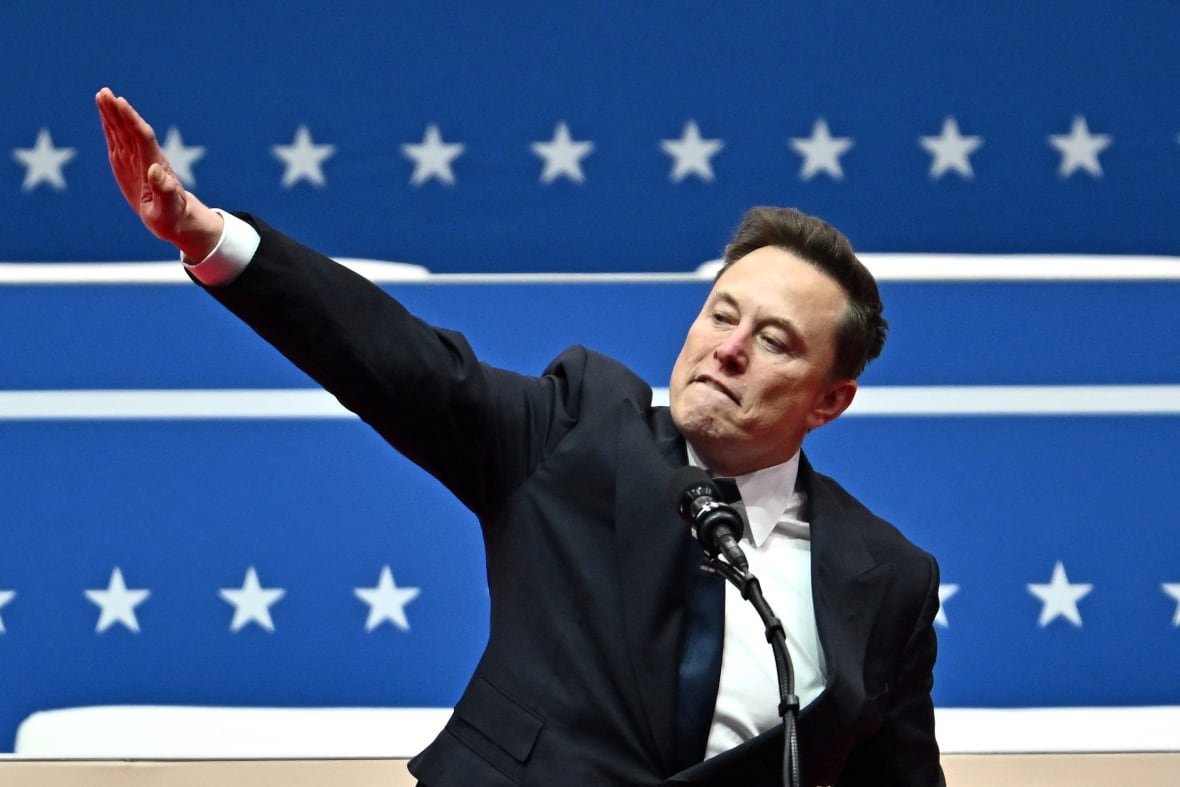 A man makes a salute.