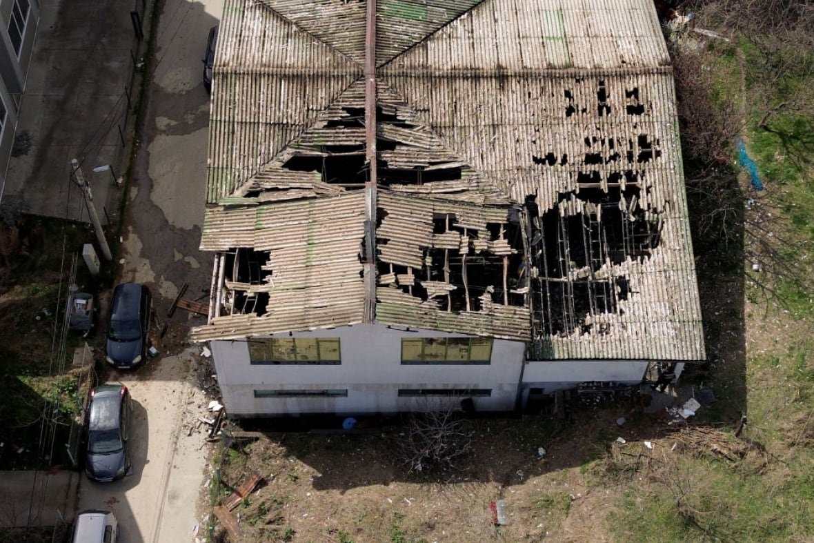 2204829281-1 A badly damaged roof.