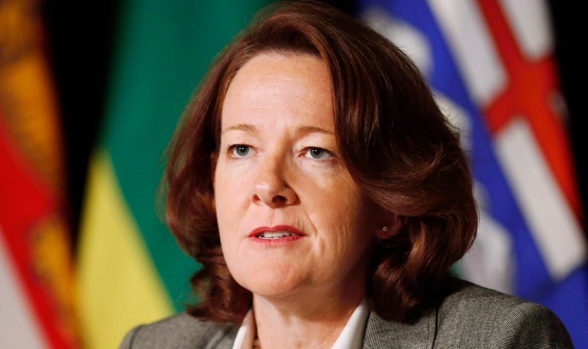 A woman is pictured in a blazer.