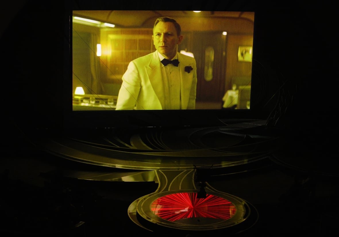 A tribute to the 60 years of James Bond 007 films is played on a screen at the 94th Academy Awards in Hollywood.