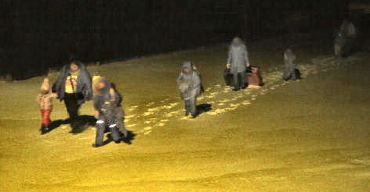 coutts-border-crossing RCMP released images this week of a group of nine that were caught by police as they tried to cross the border from the U.S. through Coutts, Alta. into Canada.