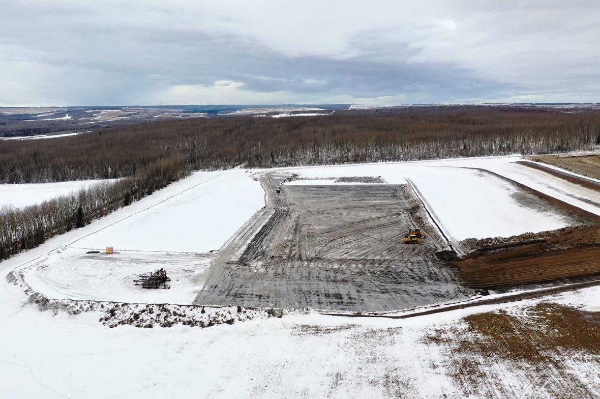 fracking-pad-in-b-c-1 A large, snowy expanse of land cleared for a fracking pad.