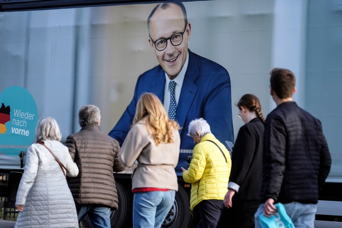 An image of Friedrich Merz, near the main election campaign event of his Christian Democratic Union (CDU).