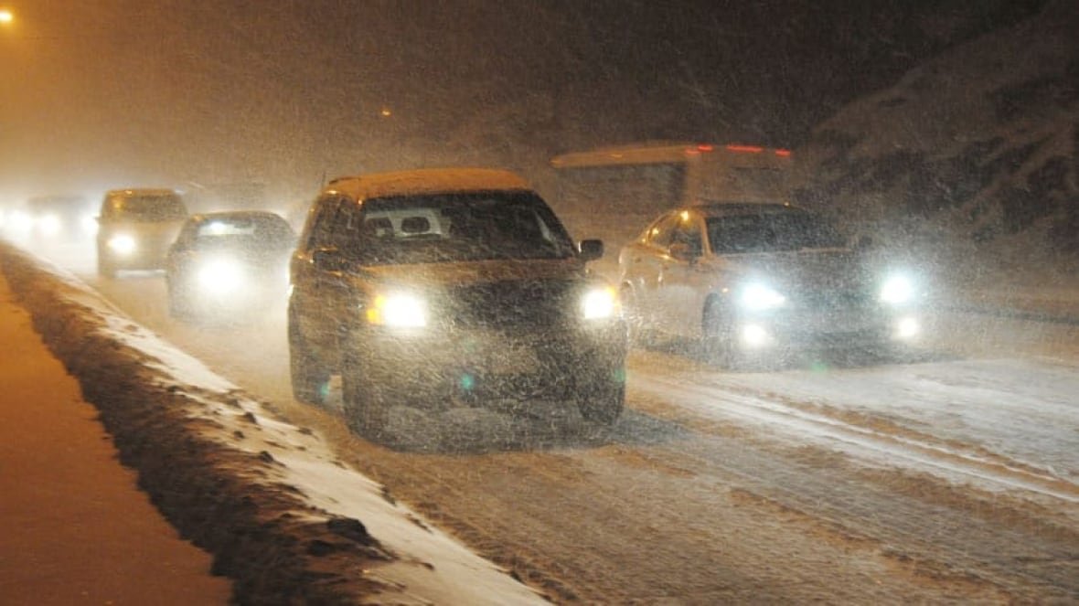 Cars driving in Canada in the winter.