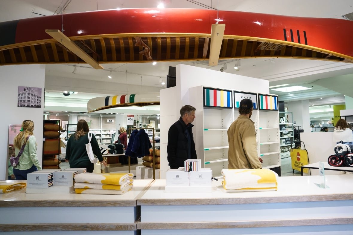 hudsons-bay-gallery-06 Shoppers browse inside a store.