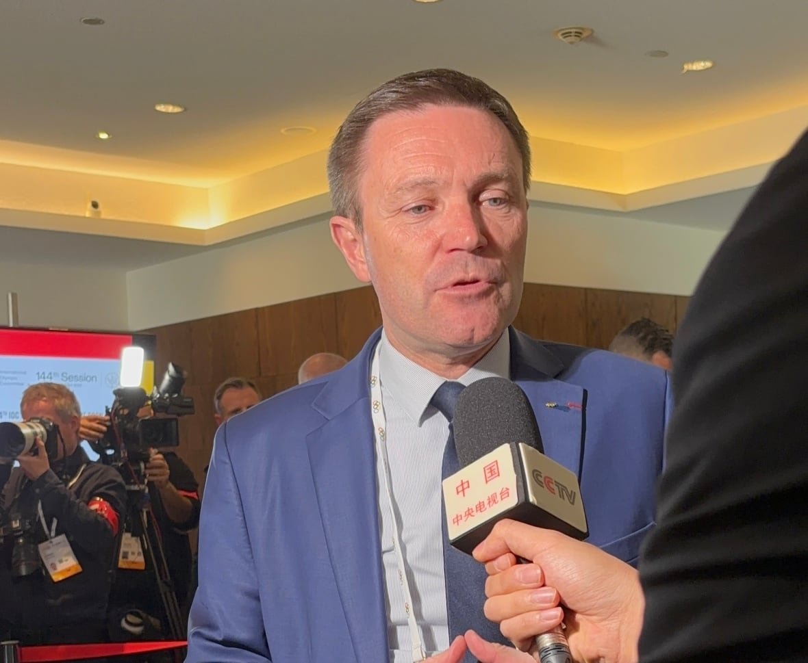 ioc-presidential-election-greece-olympics-david-lappartient A man speaks to reporters.