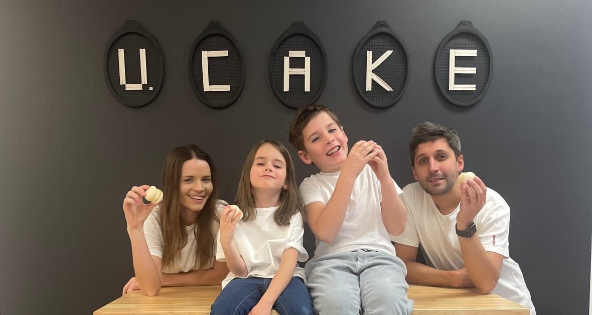 mykola-and-iryna-bilovol-with-their-children A family at a bakery.
