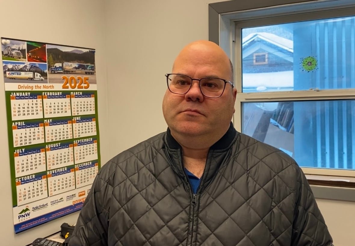 A man standing in an office