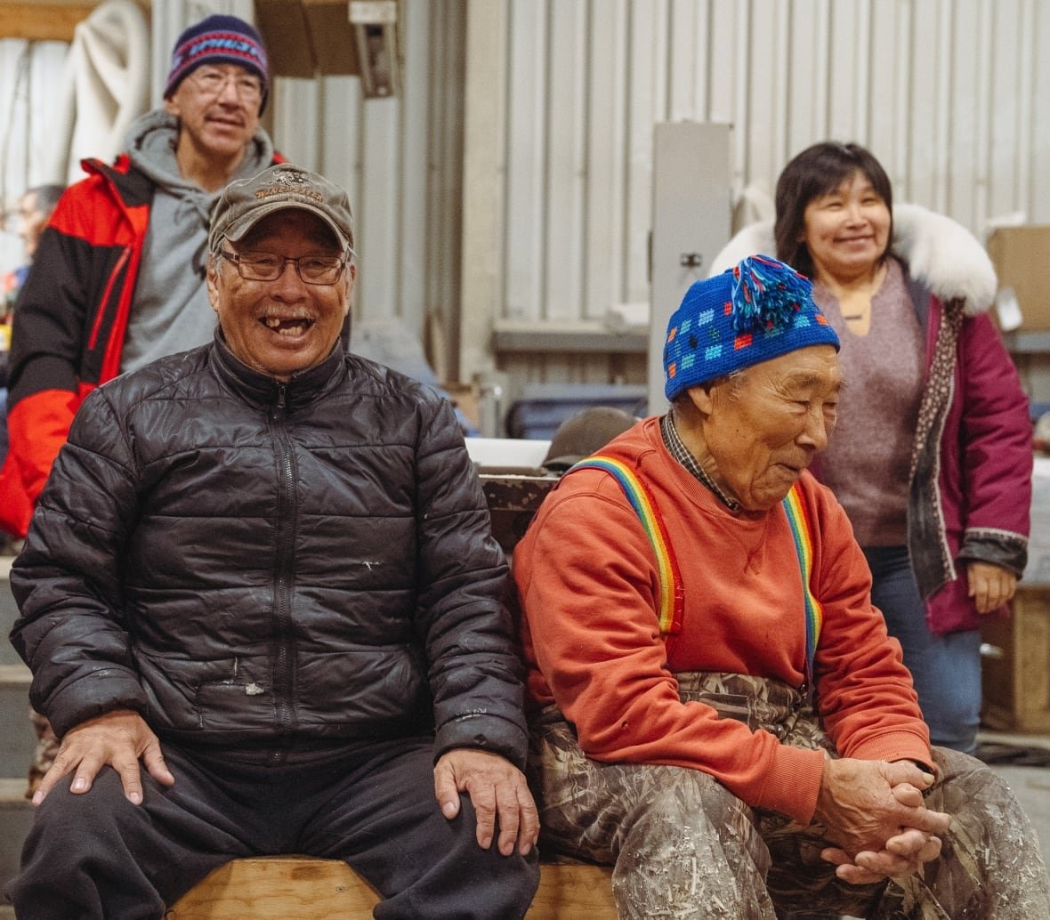 nunavik-healthy-boys-and-men-programming-2023 In Inukjuak 2023, Unaaq Men’s Association giving tour of their shop. Annie Nulukie is seen in the back.