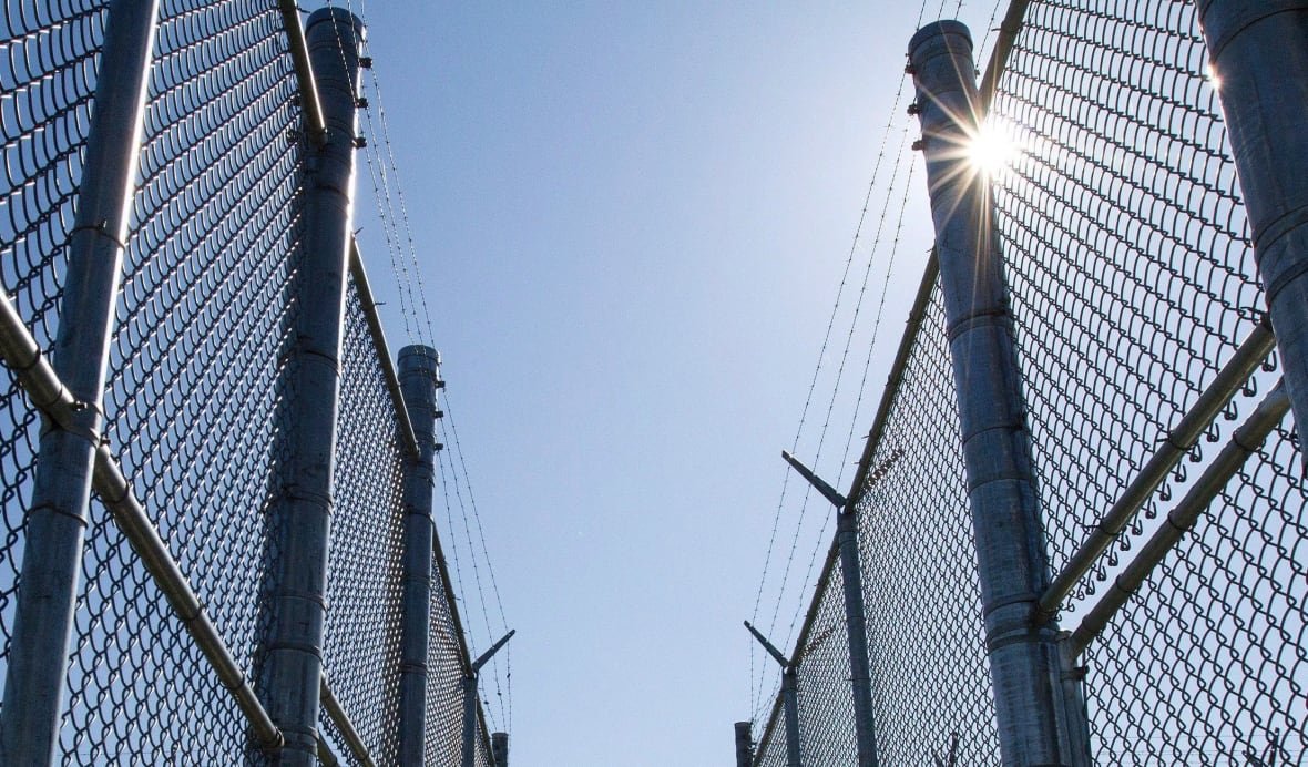 Fences with razor wire are shown at Collins Bay Institution in Kingston, Ont.