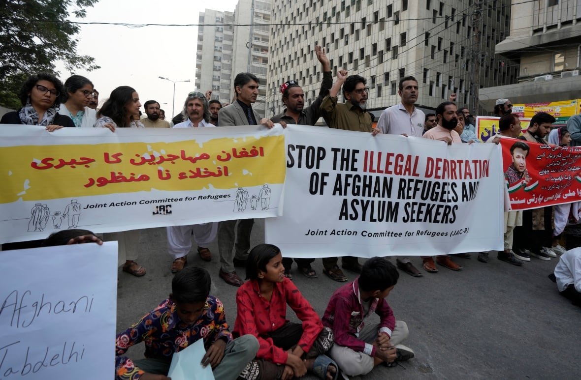 pakistan-afghanistan-migration Joint action committee for refugees hold banners during a demonstration.