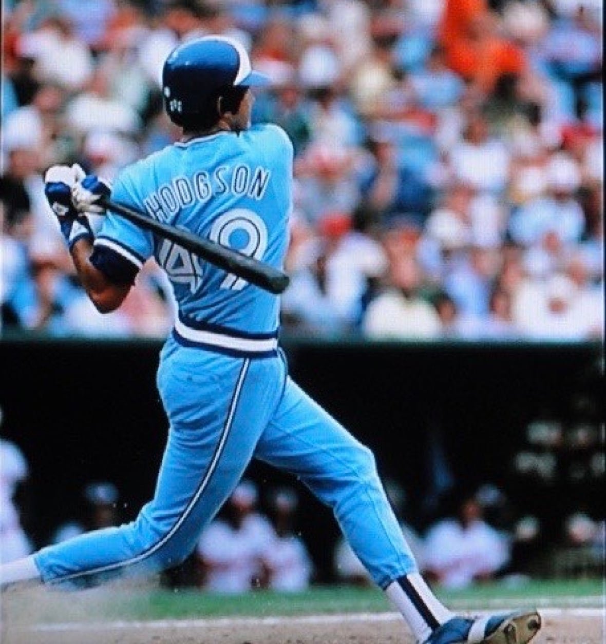 paul-hodgson-on-jays A man in a Blue Jays uniform batting