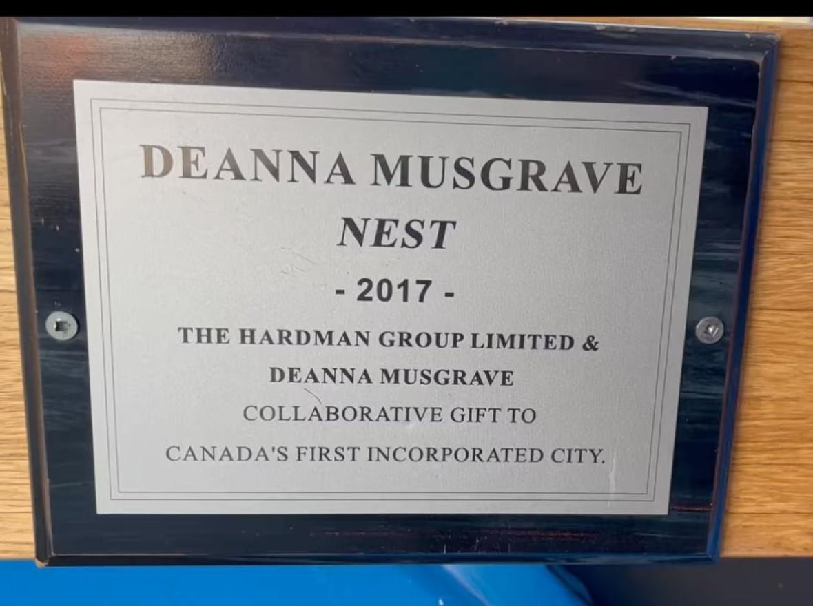 plaque-nest-saint-john A plaque that says "DEANNA MUSGRAVE NEST -2017 - THE HARDMAN GROUP LIMITED & DEANNA MUSGRAVE COLLABORATIVE GIFT TO CANADA'S FIRST INCORPORATED CITY"