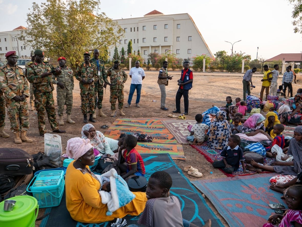south-sudan-violence South Sudan People's Defense Forces (SSPDF)'s senior officials, visit Sudanese nationals seeking safety at the army headquarters after a night of violence in Juba, South Sudan.