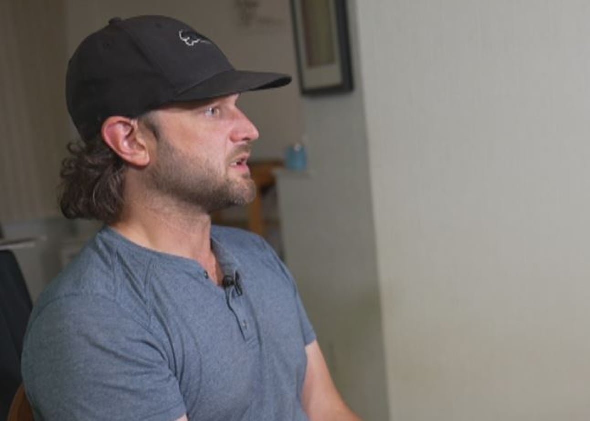 steven-whitehead A man wearing a black baseball cap is pictured in profile.