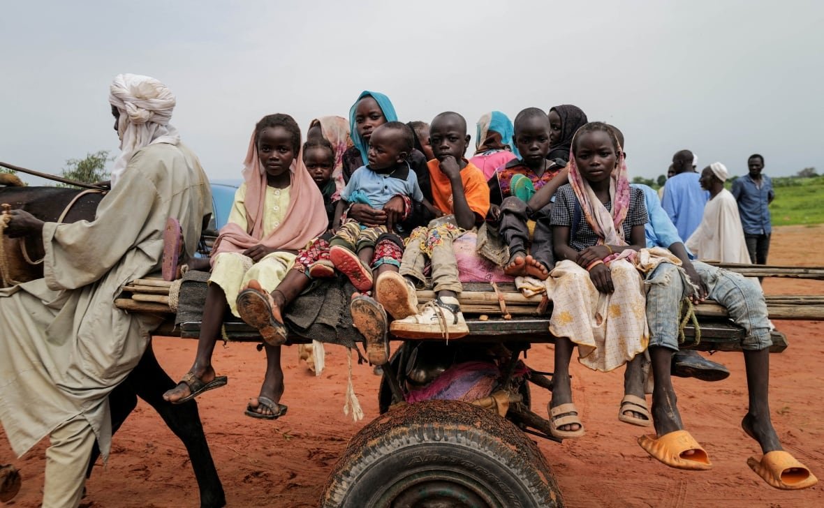 sudan-politics-chad-refugees Sudanese children, who fled the conflict in Murnei in Sudan's Darfur region, ride a cart while crossing the border between Sudan and Chad in Adre, Chad August 4, 2023.