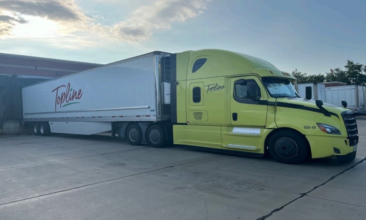 A photo of Al Kawwaz's transport truck and trailer that he used to smuggle people into the United States.