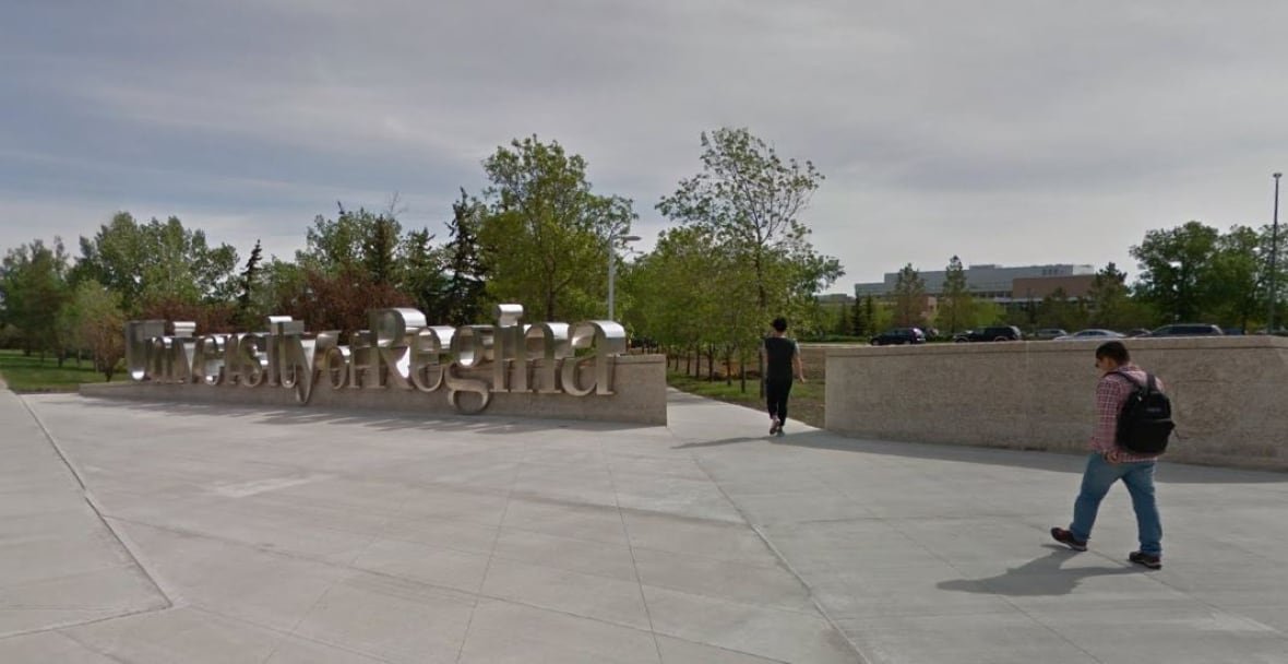 university-of-regina University of Regina sign with students walking past.