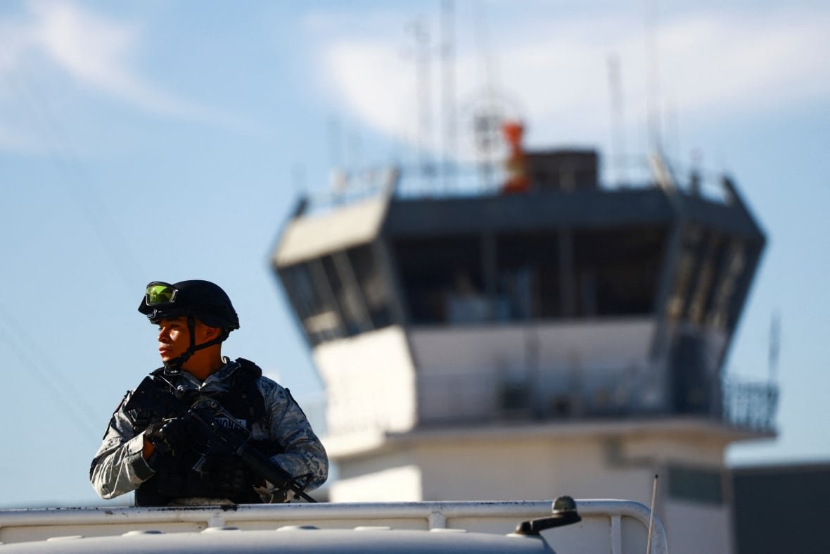 usa-trump-mexico-border-2 A soldiers looks on from a watchtower