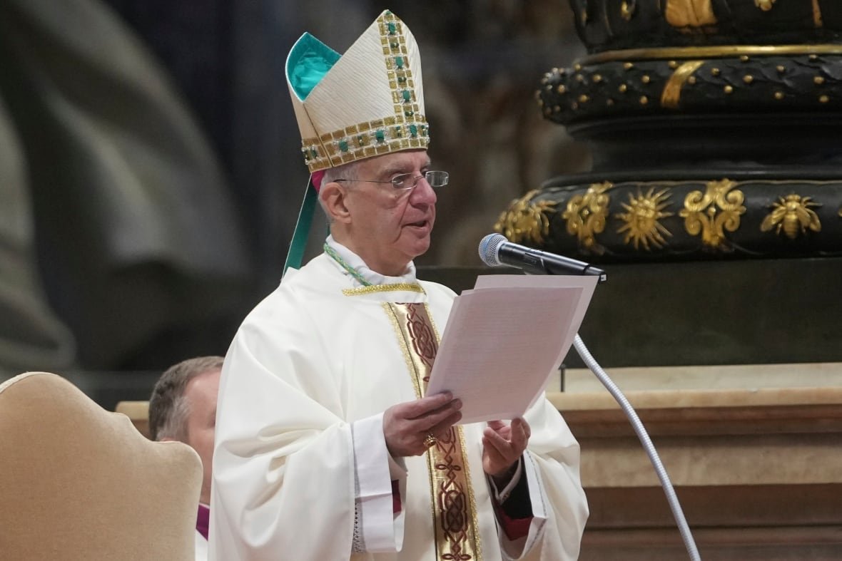 vatican-pope-health-1 A person in religious garb reads off a piece of paper during a service.
