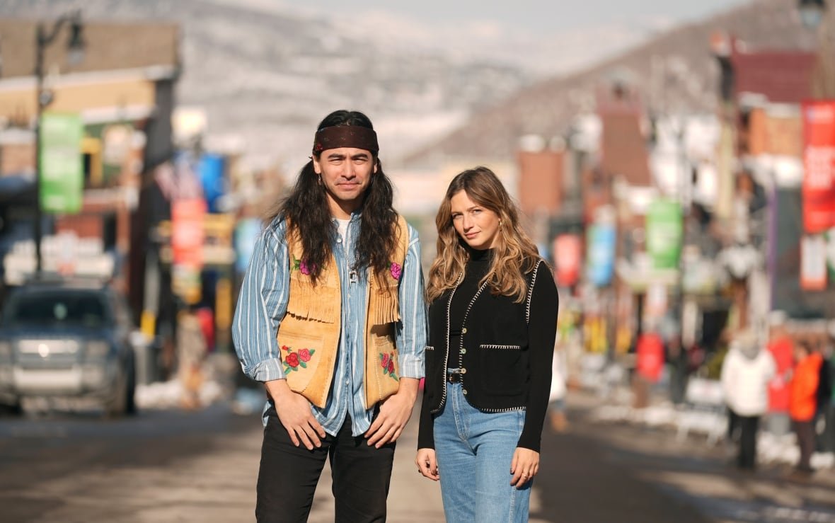 2025-sundance-film-festival-sugarcane-portrait-session Julian Brave NoiseCat, left, and Emily Kassie, co-directors of the Oscar-nominated documentary film "Sugarcane," pose for a portrait on Main Street during the Sundance Film Festival.