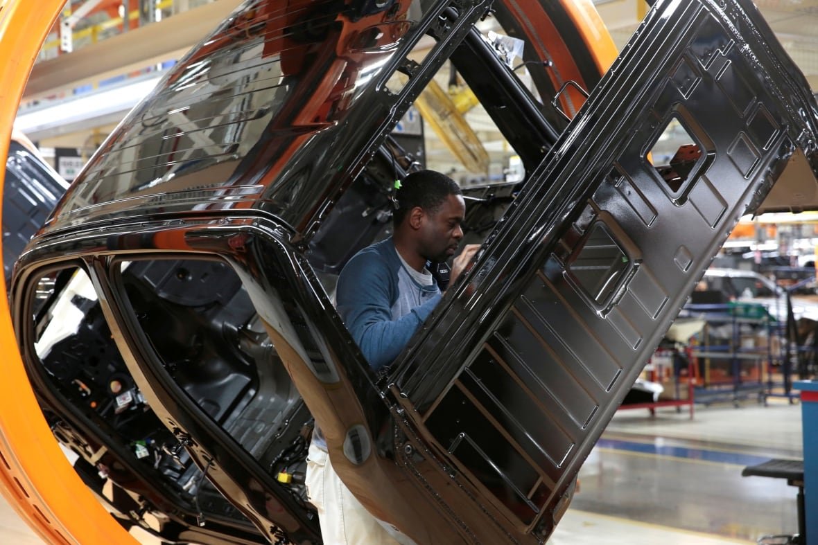 autos-fca-ram-trucks-1 A Fiat Chrysler Automobiles assembly worker is at work on a 2019 Ram pickup truck at the FCA Sterling Heights Assembly Plant in Sterling Heights, Michigan, U.S., October 22, 2018. Picture taken on October 22, 2018. REUTERS/Rebecca Cook