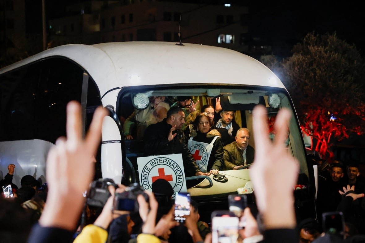 A crowd in Ramallah waits to greet freed Palestinian prisoners.