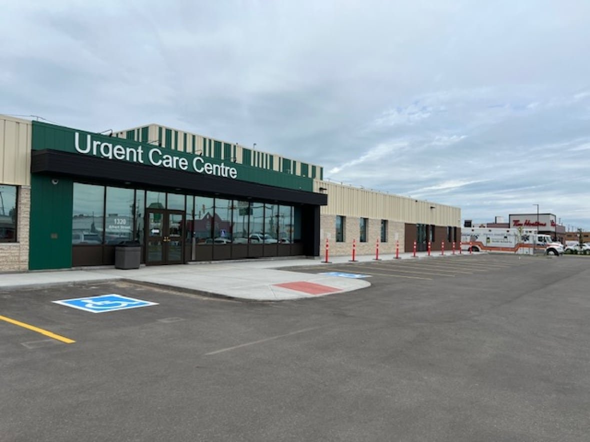 regina-urgent-care-centre A large medical building with emergency vehicle on the side of it.