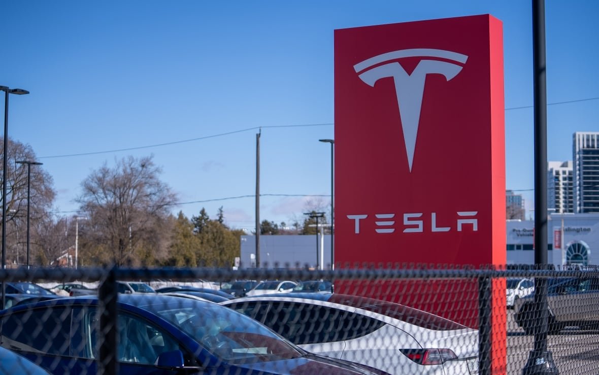 tesla-dealership Ground and drone images of Tesla electric vehicle dealership in Etobicoke, ON