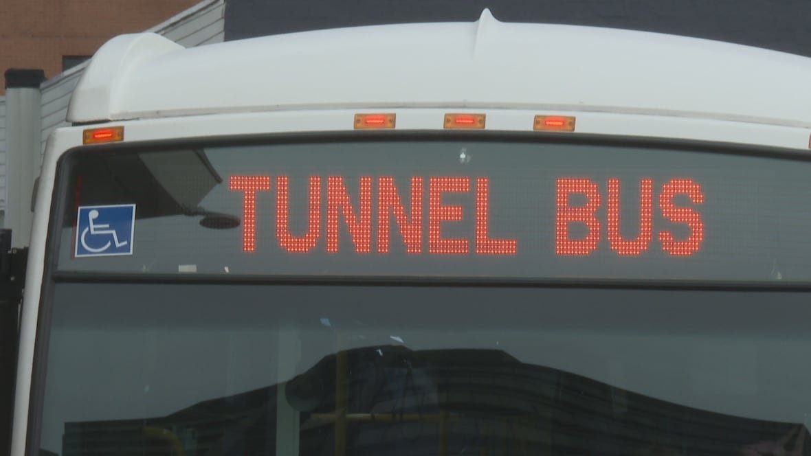 tunnel-bus-1 A sign on a bus.