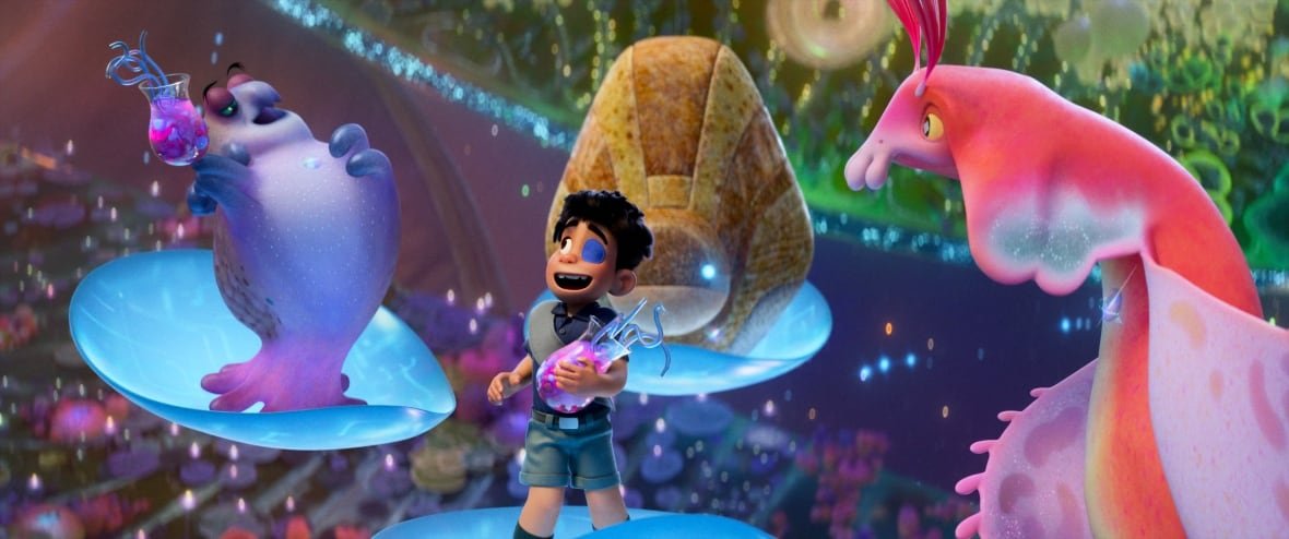 elio An animated image is shown. In it, an ecstatically grinning boy stands on a floating platform. He is surrounded by aliens on similar platforms.