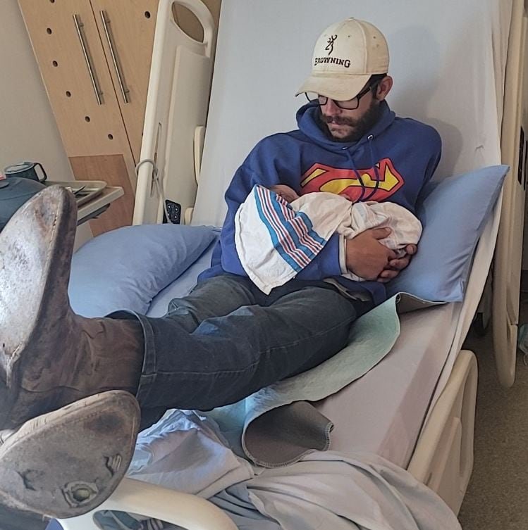 Bailey shared this photo of Misner with their first child.