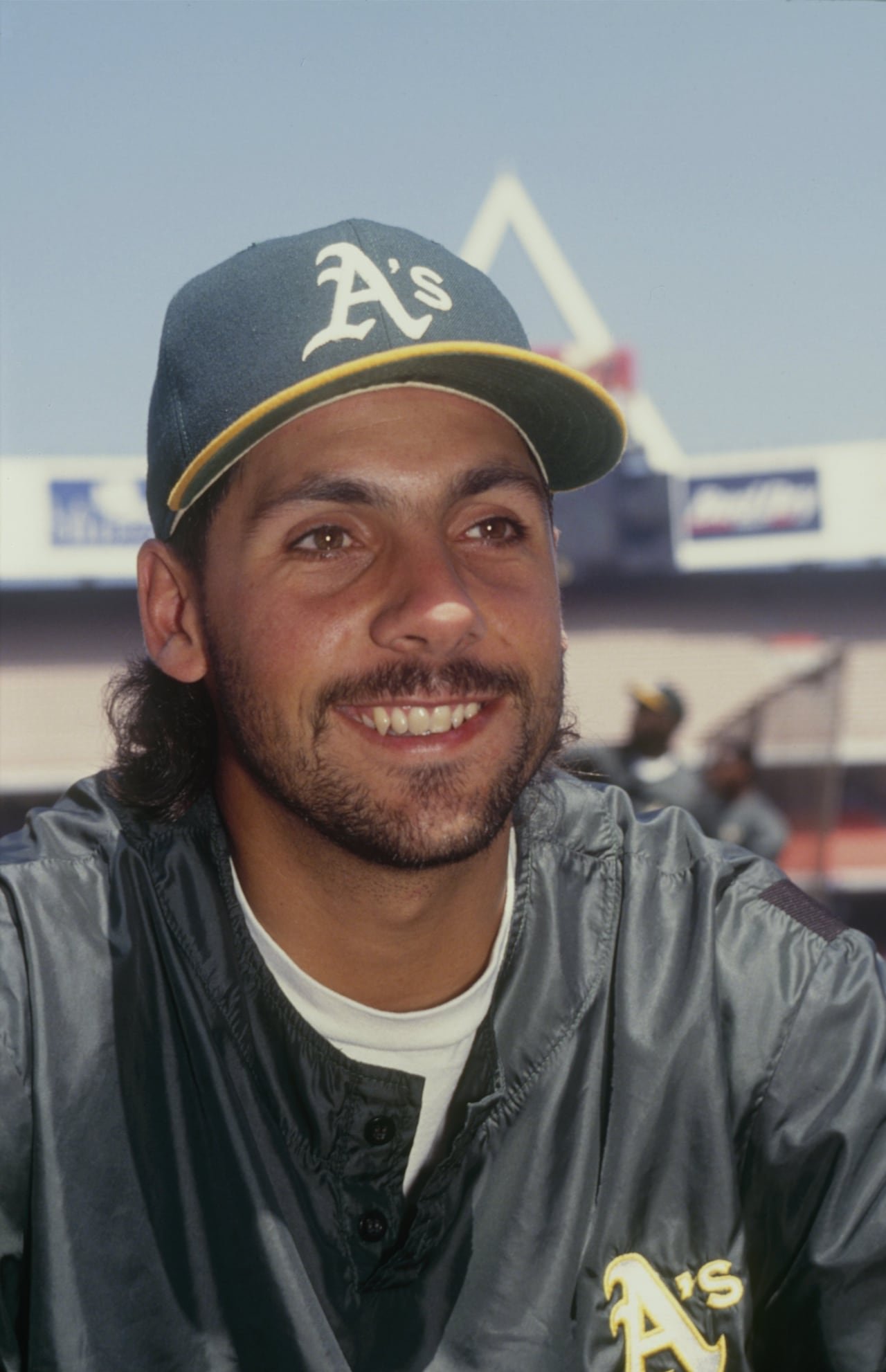 default-510 A baseball player smiles while looking away from the camera.